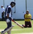 A dejected Mohammad Zaman Khan leaves the field after being caught by Mark Woodhead