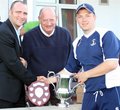 Neil Pullen from Readers and League Chairman Norman Poole present the Readers Cup to John Cordingley