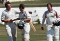 Alex Smith receives congratulations for his 121no