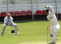 Dean Bell drives through the covers 