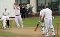 Gary Collins takes the caught and bowled to dismiss Brett Pelser
