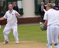 Gary Collins and Chris D'Leny watch as ball is played on the leg side 