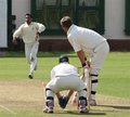 Graham Lee waits as Ameer Khan runs up to bowl