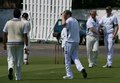 Gareth Denwood is congratulated on taking a wicket