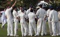 St Annes gather at the fall of a wicket